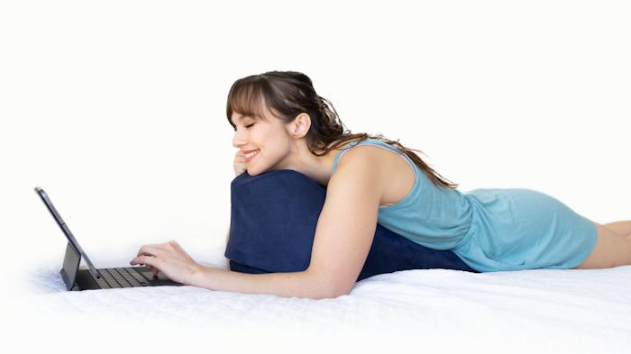 Prone Cushion: An ergonomic cushion designed for lying down